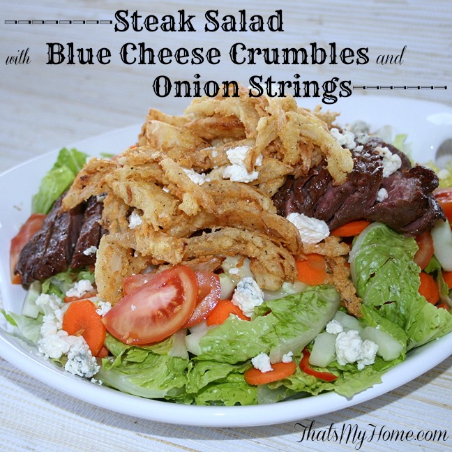 Steak Salad with Blue Cheese Crumbles and Onion Strings