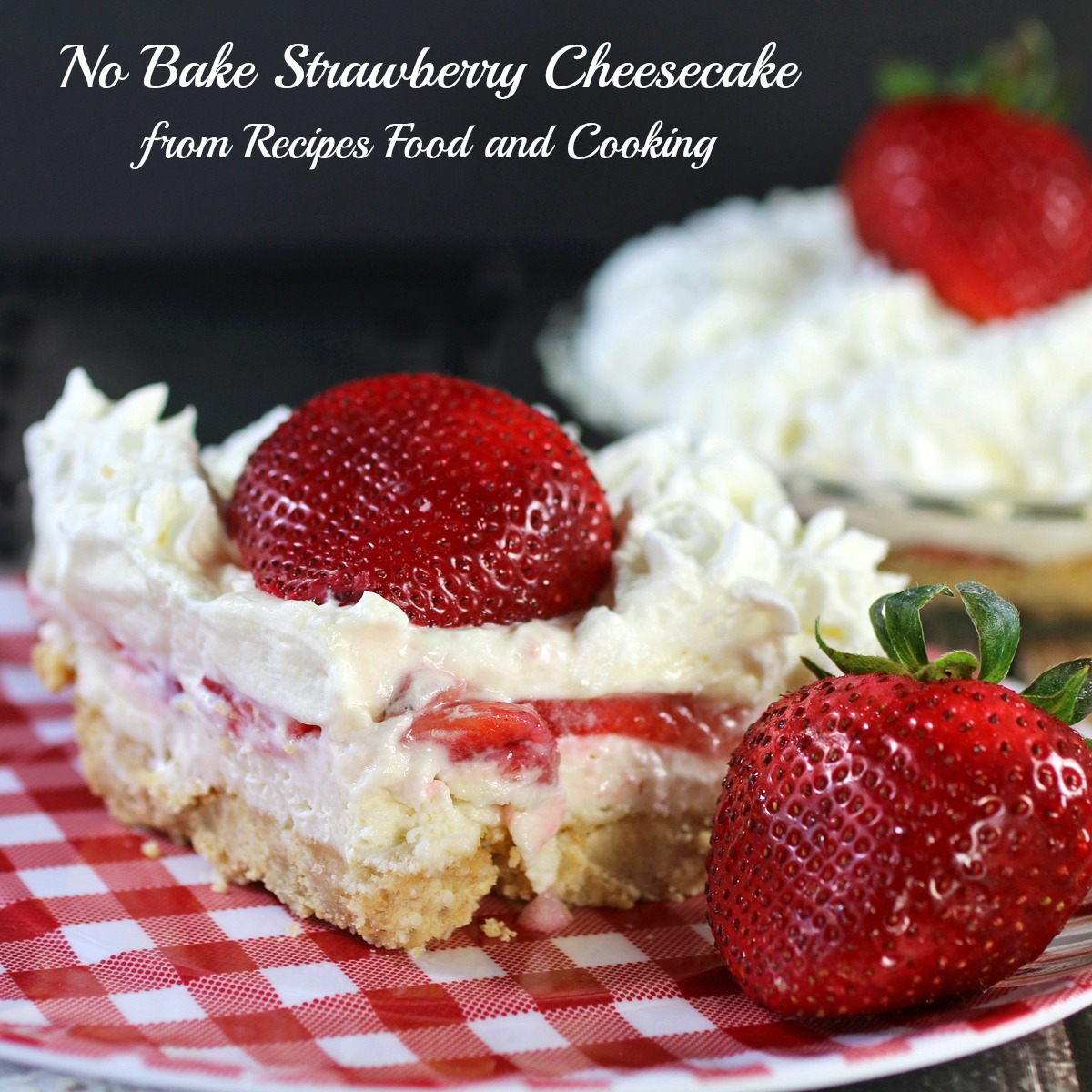 A close up of a slice of cake on a plate, with Strawberry and Cream